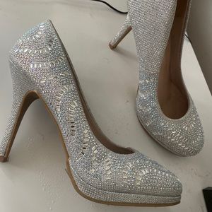 Diamond crusted heels .